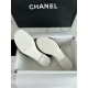 Chanel Black Double C Embroidered Slides: Featuring a Striking Black and White Color Block Design on the Upper, Karen Satin Fabric with Imported Thread Embroidery, Finished with a White Leather Sole. 