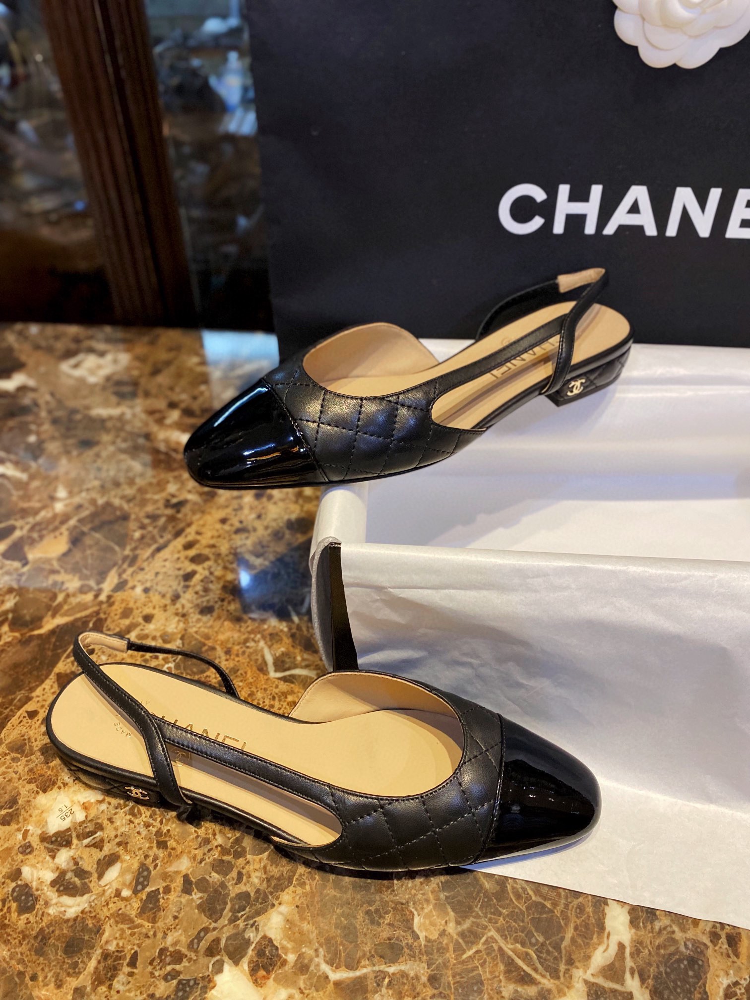 Chanel Black Diamond Pattern Flat Slingback: Imported Lamb Leather with Patchwork Cow Patent Leather Toe, 