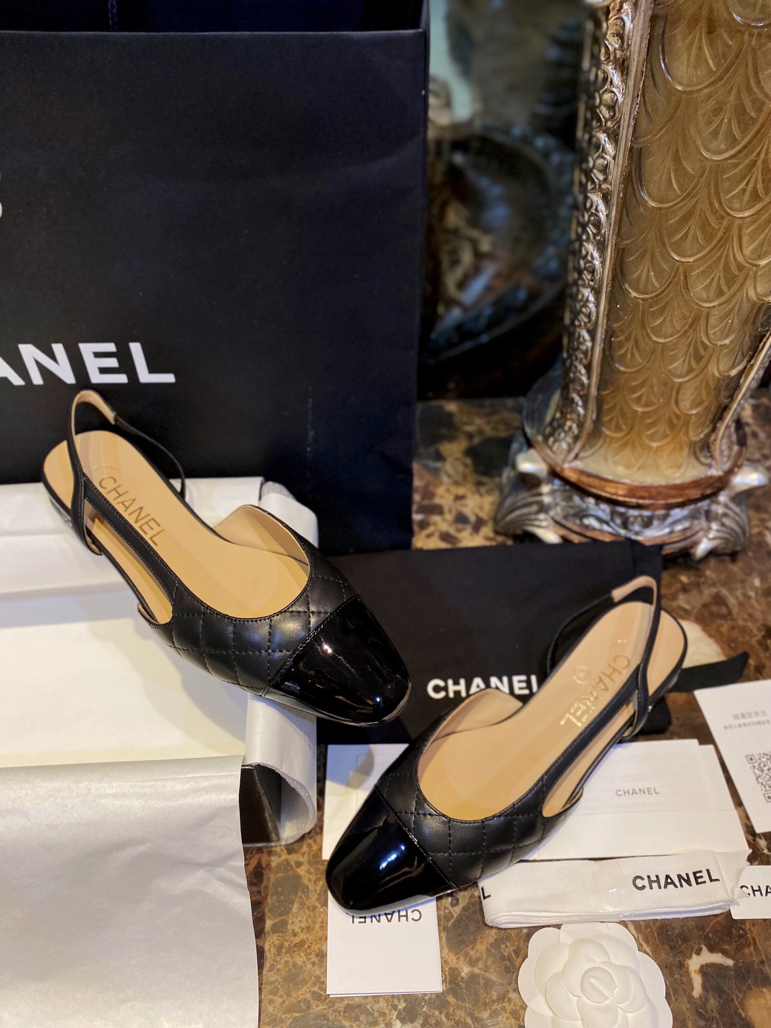 Chanel Black Diamond Pattern Flat Slingback: Imported Lamb Leather with Patchwork Cow Patent Leather Toe, 