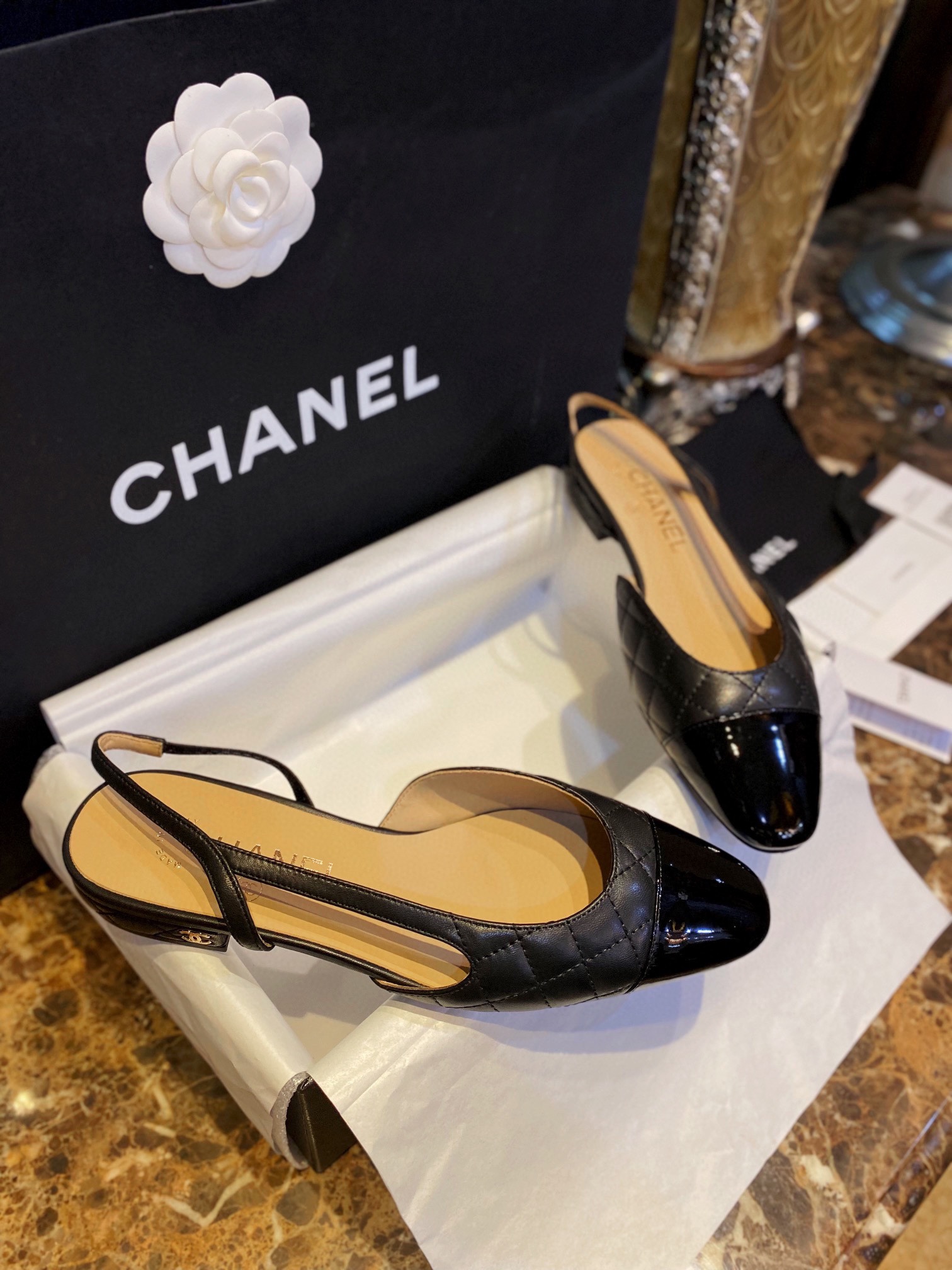 Chanel Black Diamond Pattern Flat Slingback: Imported Lamb Leather with Patchwork Cow Patent Leather Toe, 