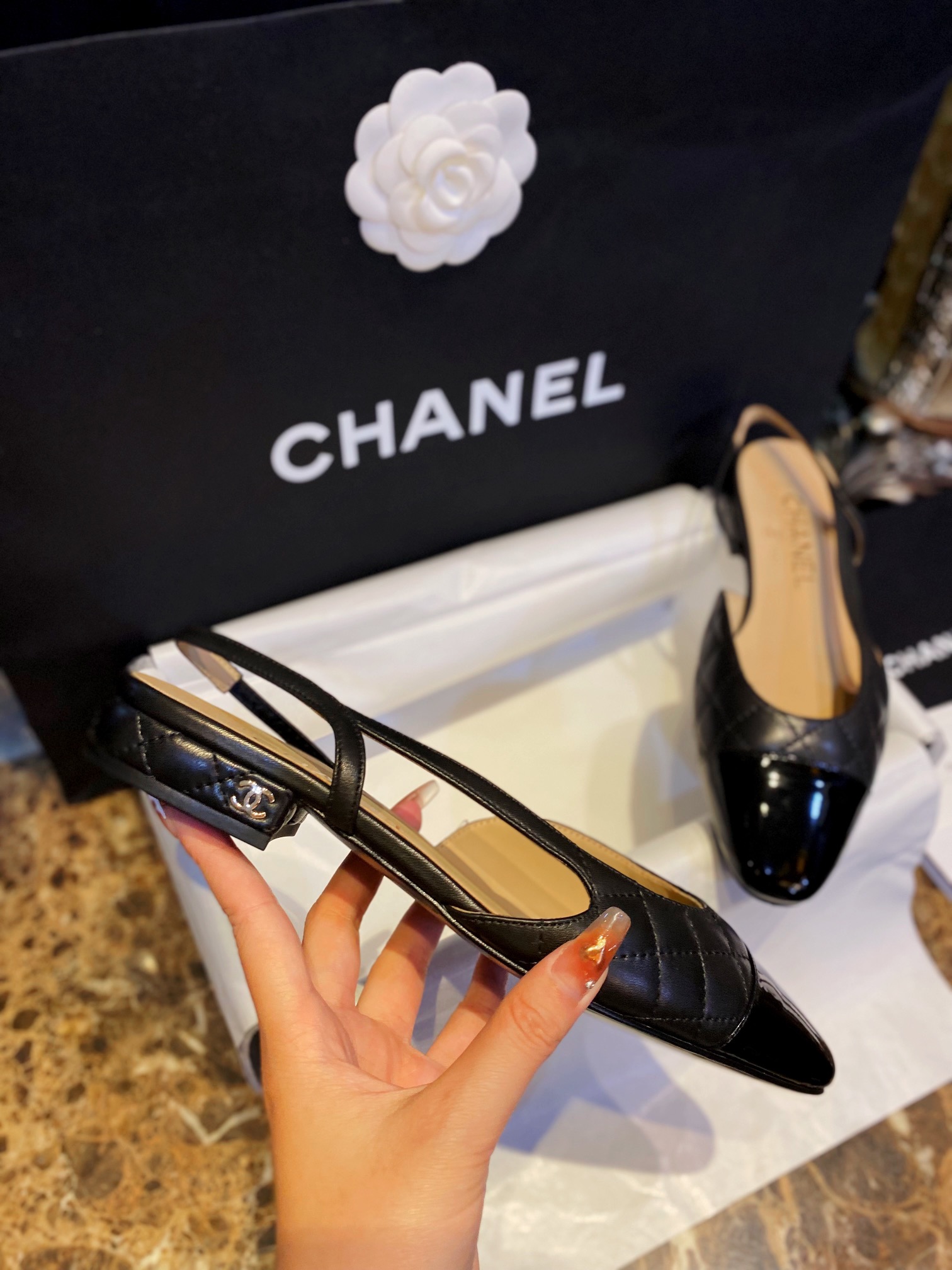 Chanel Black Diamond Pattern Flat Slingback: Imported Lamb Leather with Patchwork Cow Patent Leather Toe, 