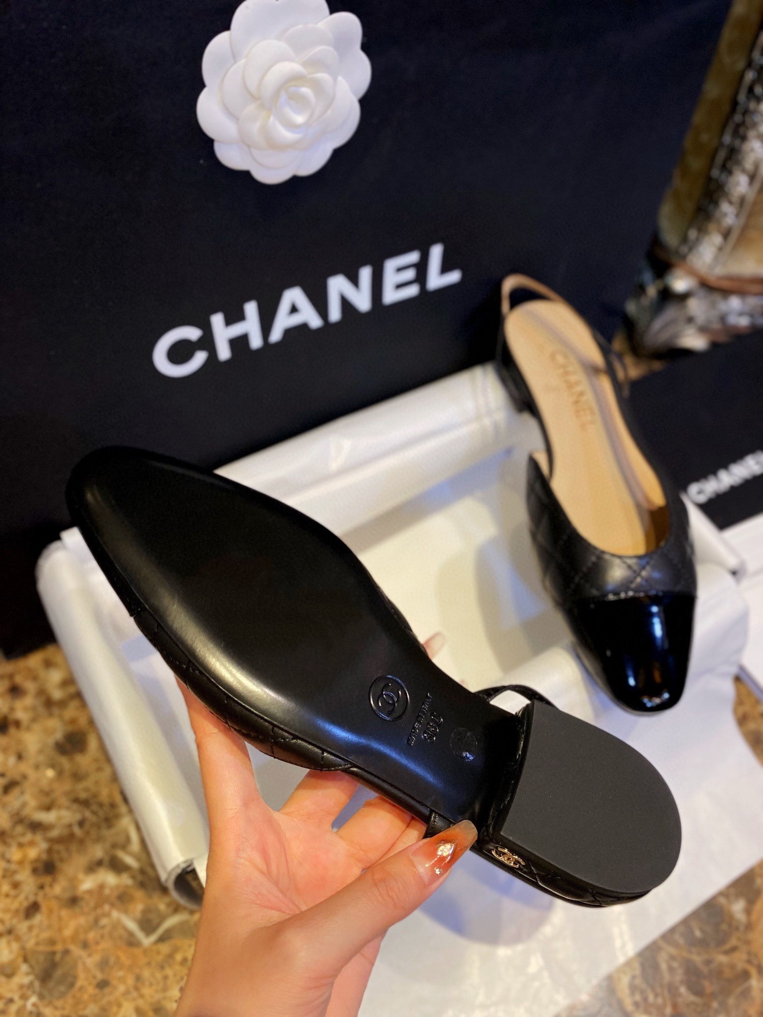 Chanel Black Diamond Pattern Flat Slingback: Imported Lamb Leather with Patchwork Cow Patent Leather Toe, 