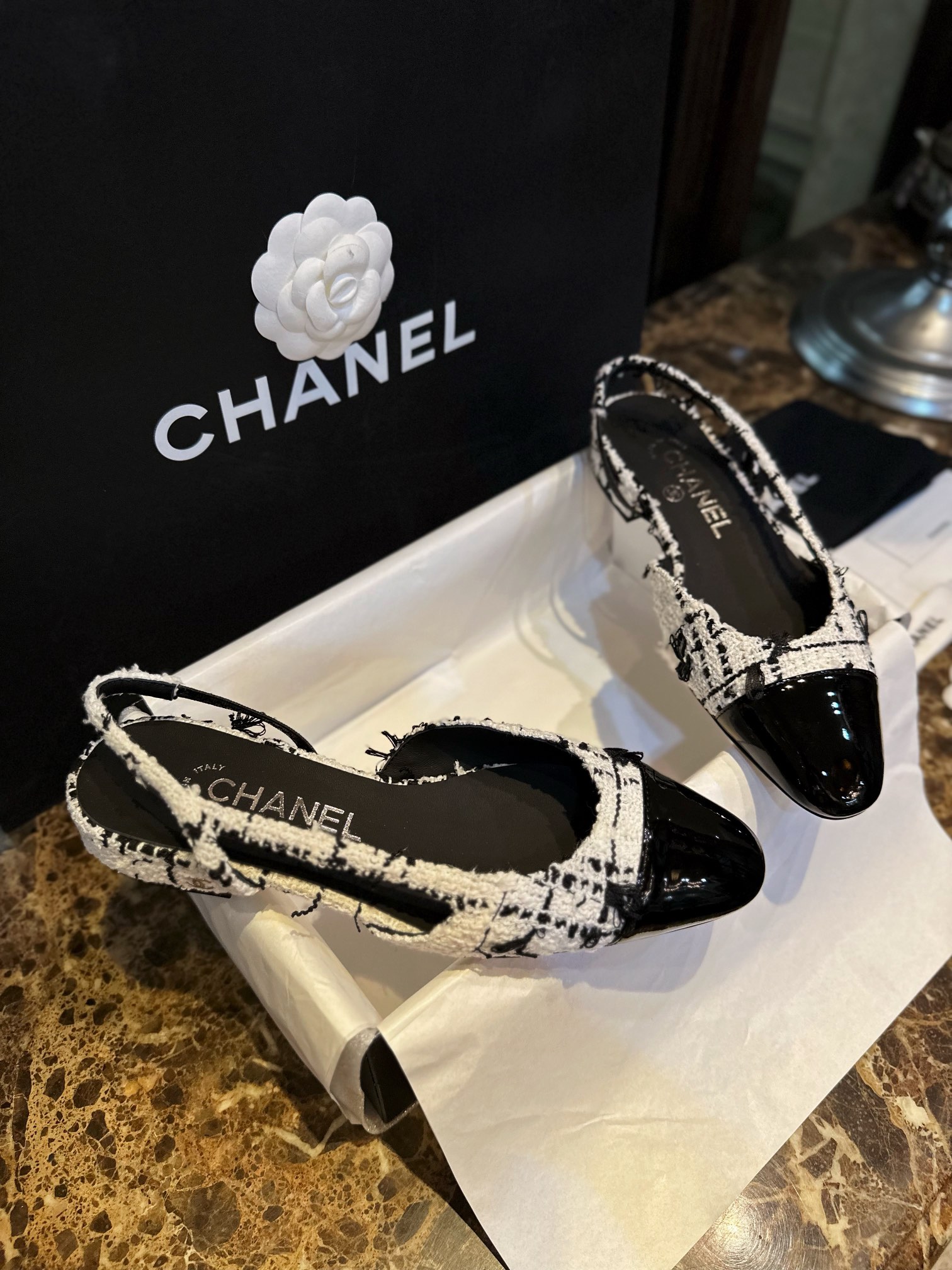 Chanel Black and White Bouclé Flat Shoes - Elegant Fusion of Calf Patent Leather