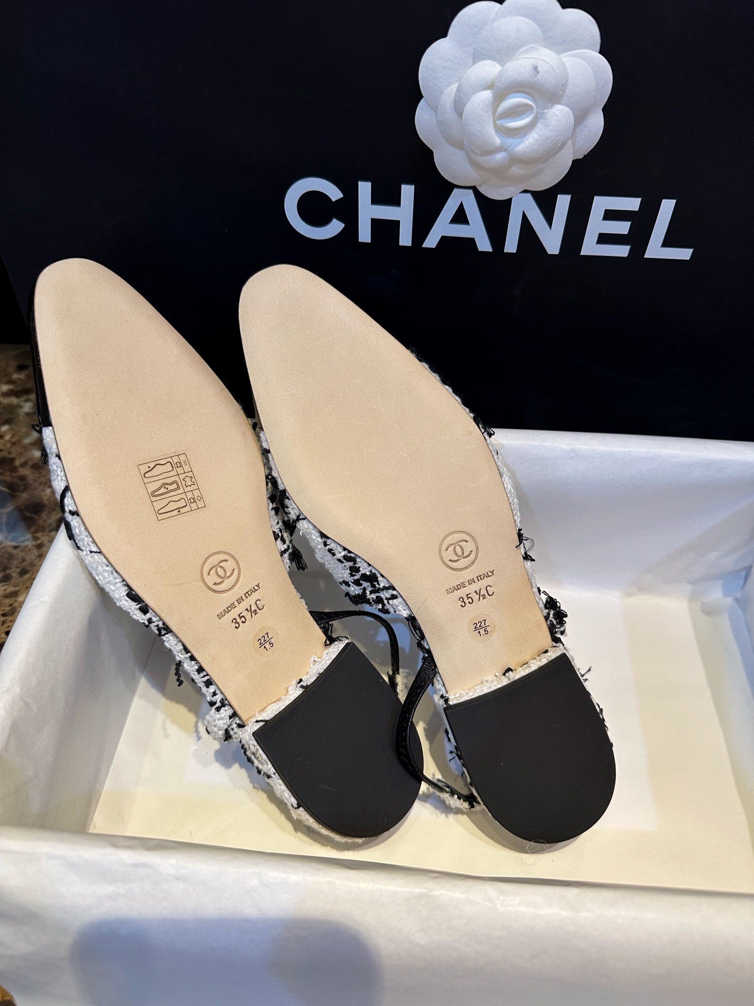 Chanel Black and White Bouclé Flat Shoes - Elegant Fusion of Calf Patent Leather