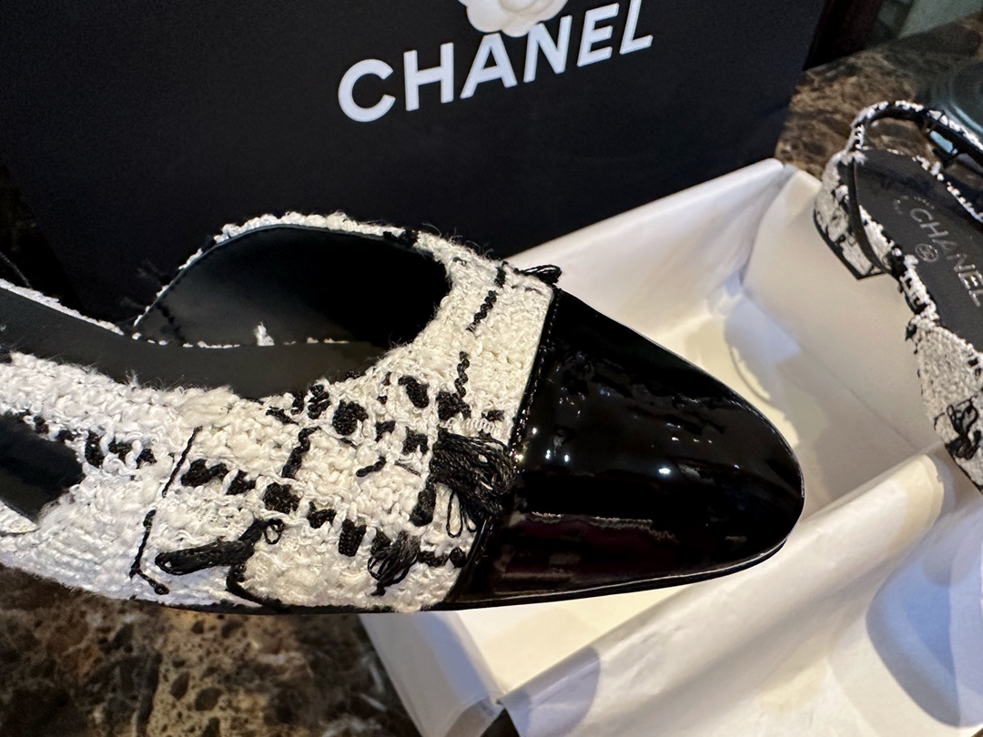 Chanel Black and White Bouclé Flat Shoes - Elegant Fusion of Calf Patent Leather