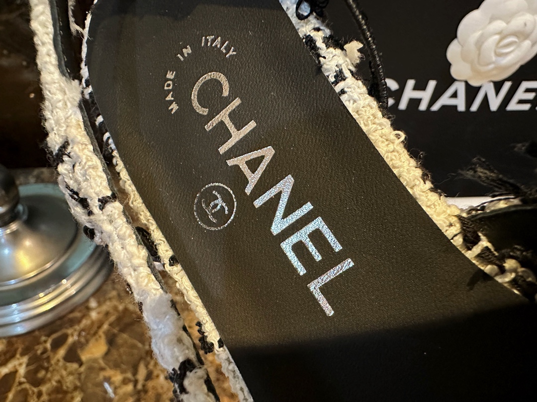 Chanel Black and White Bouclé Flat Shoes - Elegant Fusion of Calf Patent Leather