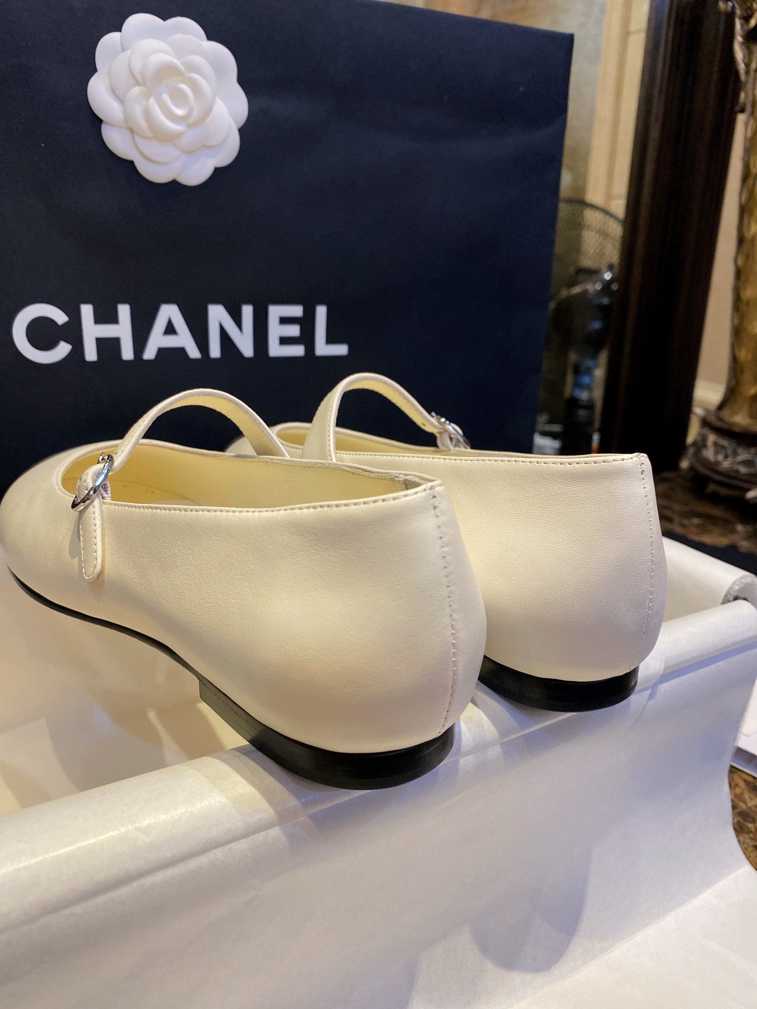 Chanel Classic White Mary Janes in Genuine Sheepskin, Adorned with Petite Double C Buckles for a Playful Twist