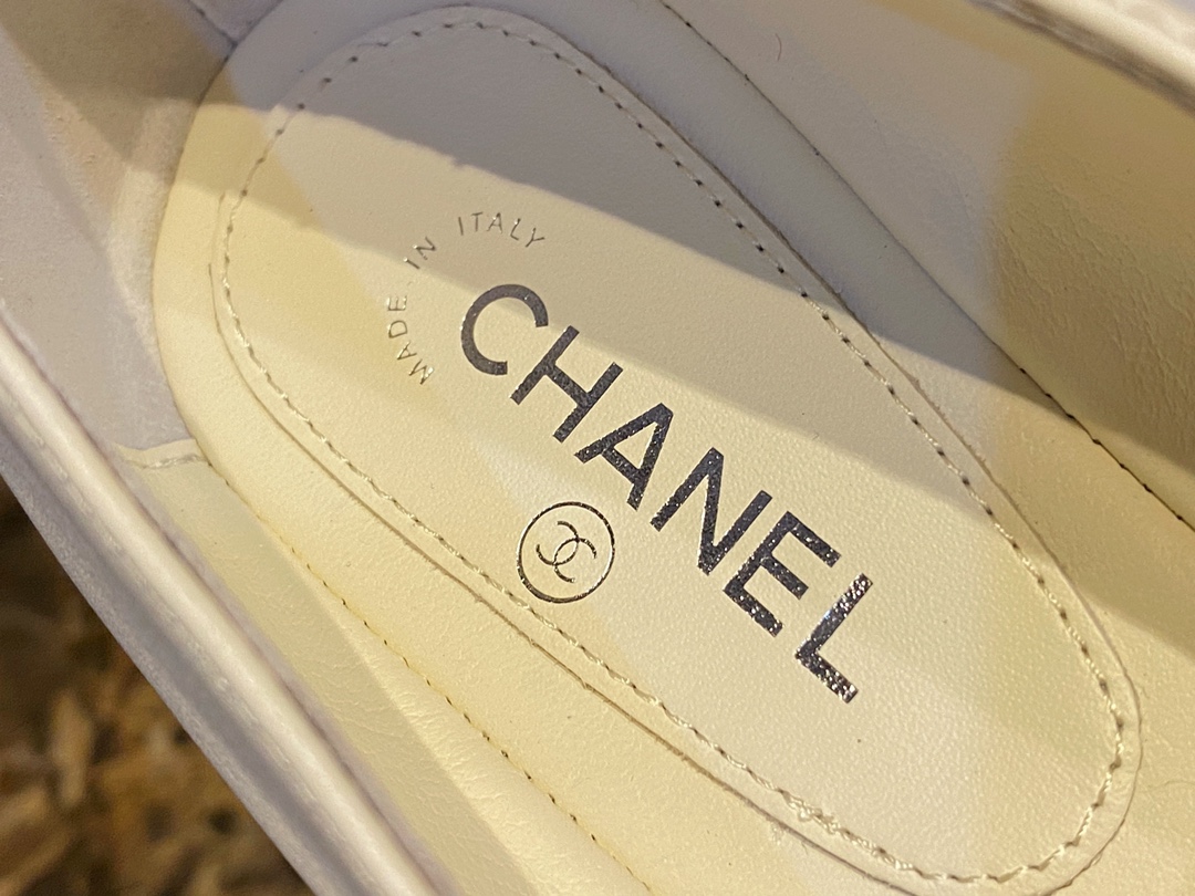 Chanel Classic White Mary Janes in Genuine Sheepskin, Adorned with Petite Double C Buckles for a Playful Twist