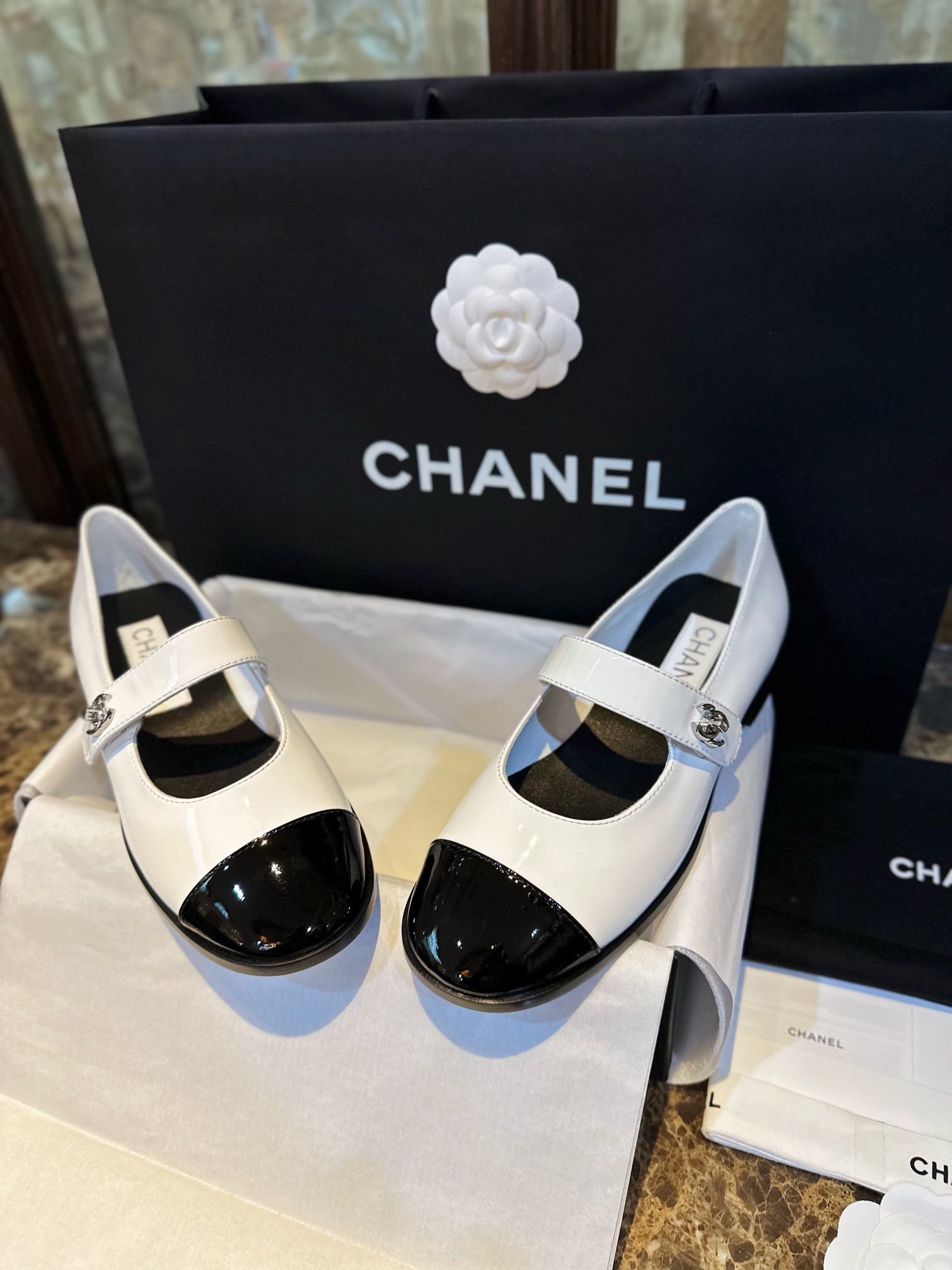 Chanel White Patent Leather Mary Jane - Black and White Calf Patent Leather Material Adds a Youthful Vibe