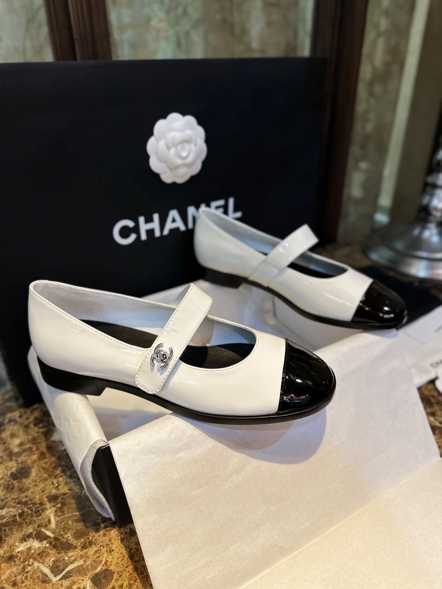 Chanel White Patent Leather Mary Jane - Black and White Calf Patent Leather Material Adds a Youthful Vibe