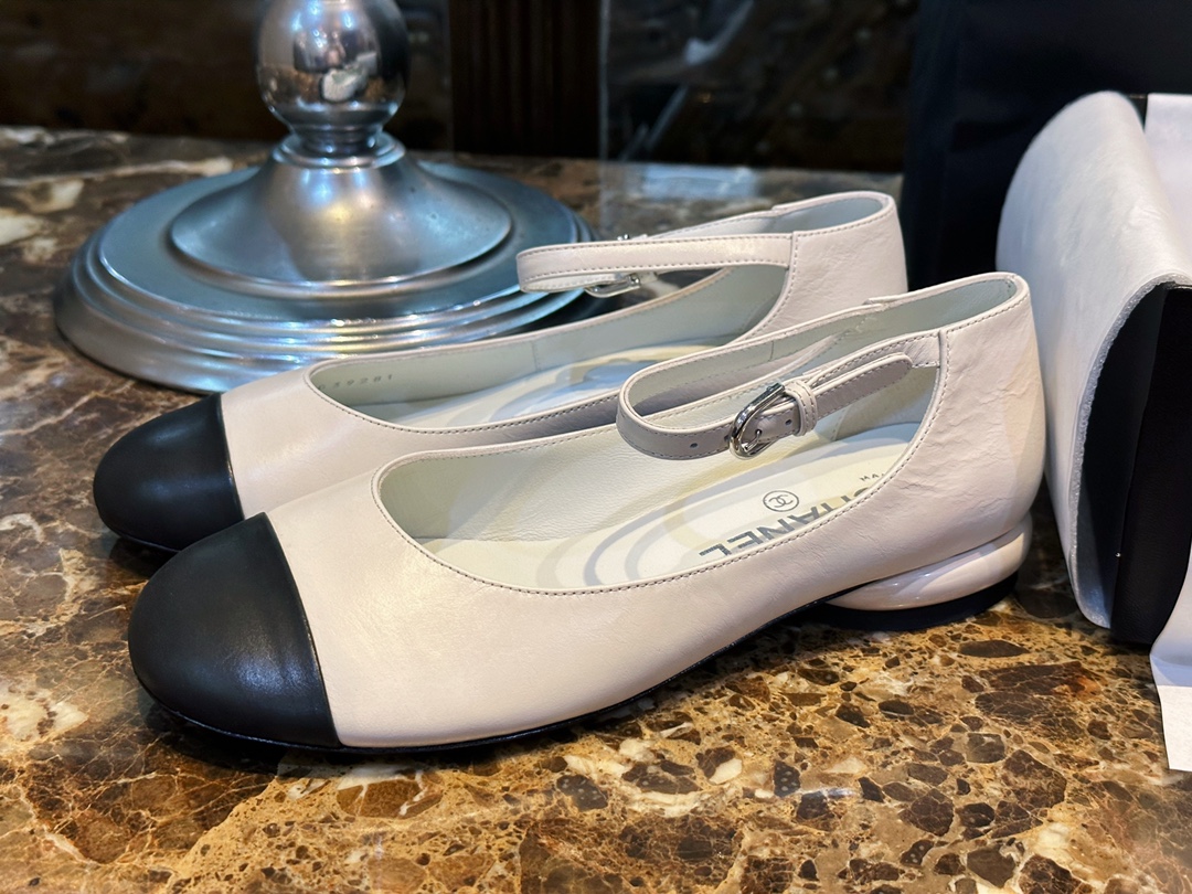 Chanel Black and White Pearl Mary Janes - Luxurious Black and White Contrast in Waxy Calf Leather, Round Toe for Youthful Look, Pearl-textured Small Heels with Exquisite Logo Detail, 