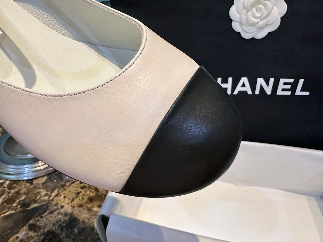 Chanel Black and White Pearl Mary Janes - Luxurious Black and White Contrast in Waxy Calf Leather, Round Toe for Youthful Look, Pearl-textured Small Heels with Exquisite Logo Detail, 