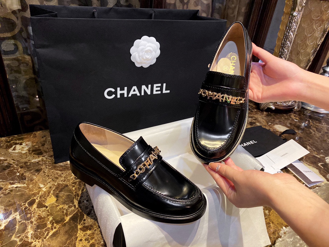 Chanel  Black Open-Sided Loafers with Pearls