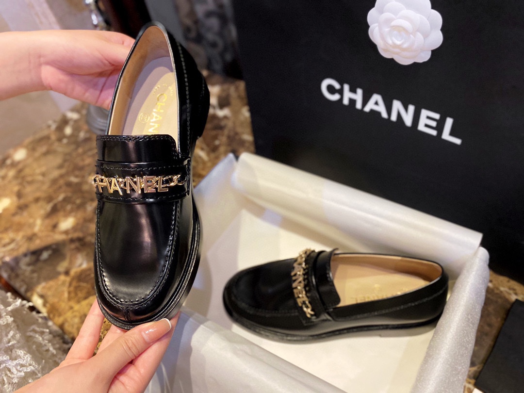 Chanel  Black Open-Sided Loafers with Pearls