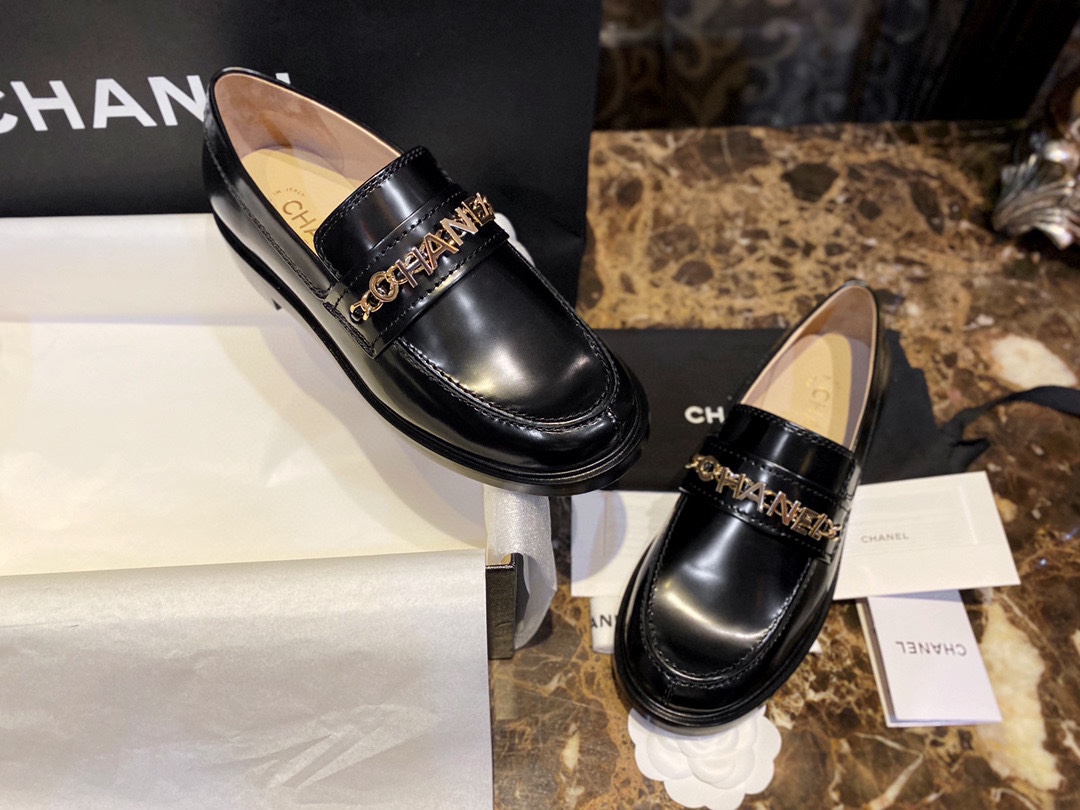 Chanel  Black Open-Sided Loafers with Pearls