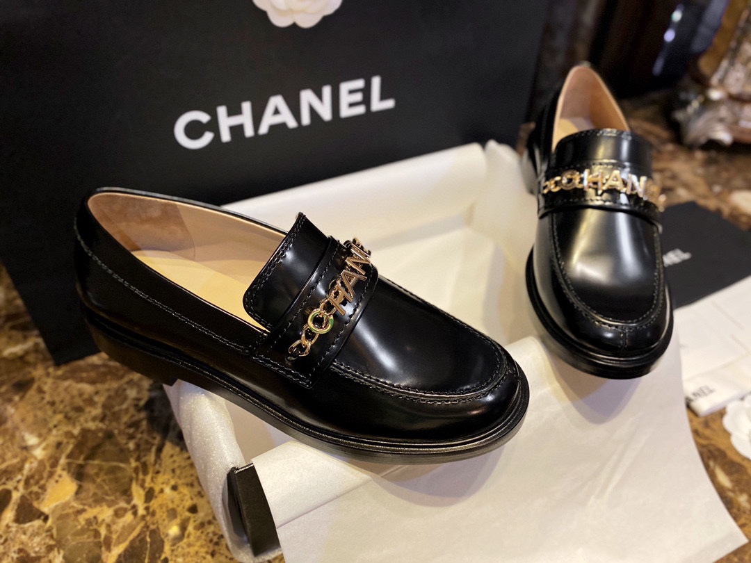 Chanel  Black Open-Sided Loafers with Pearls