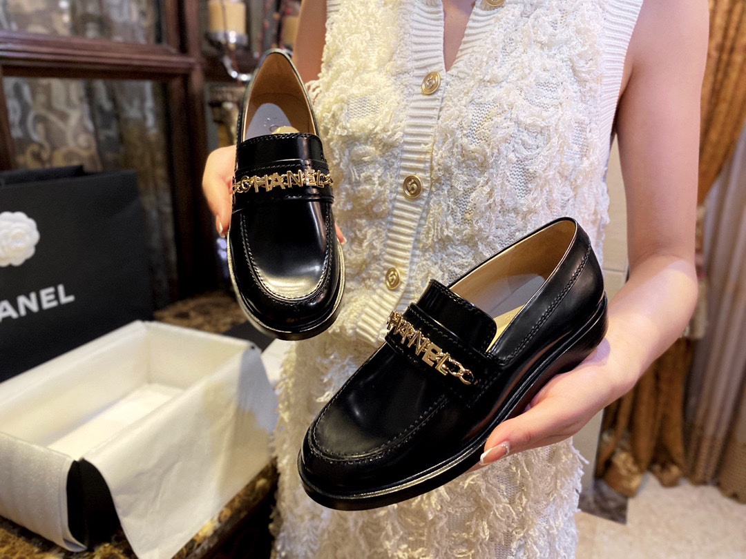 Chanel  Black Open-Sided Loafers with Pearls