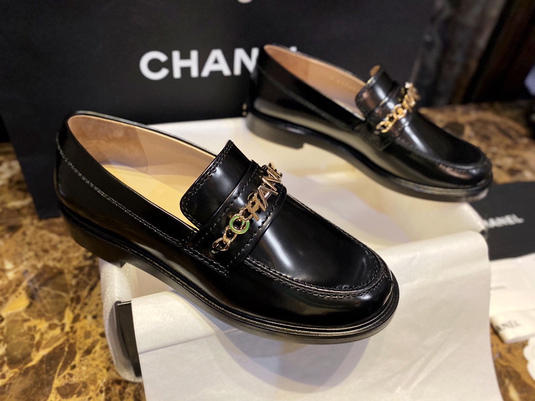 Chanel  Black Open-Sided Loafers with Pearls