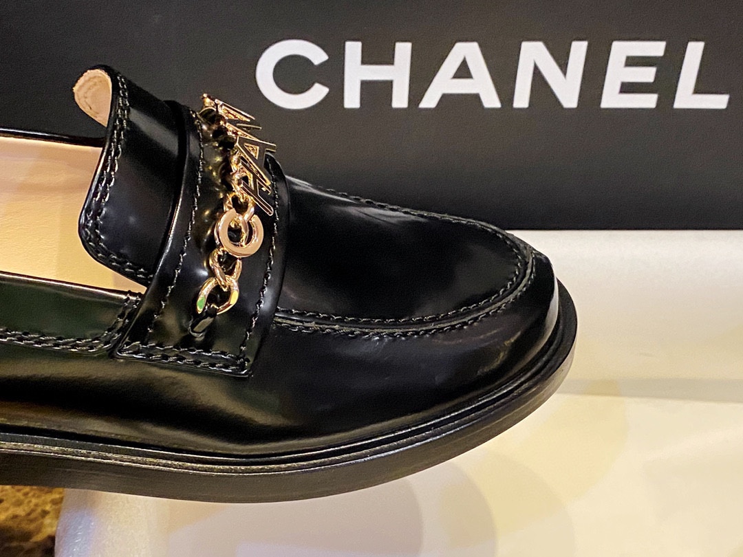 Chanel  Black Open-Sided Loafers with Pearls