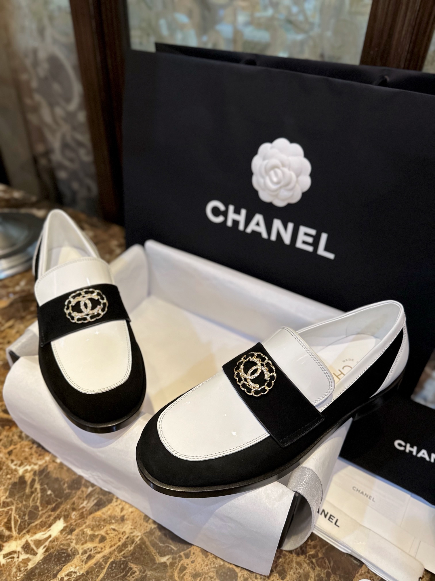 Chanel Black and White Round Buckle Loafers