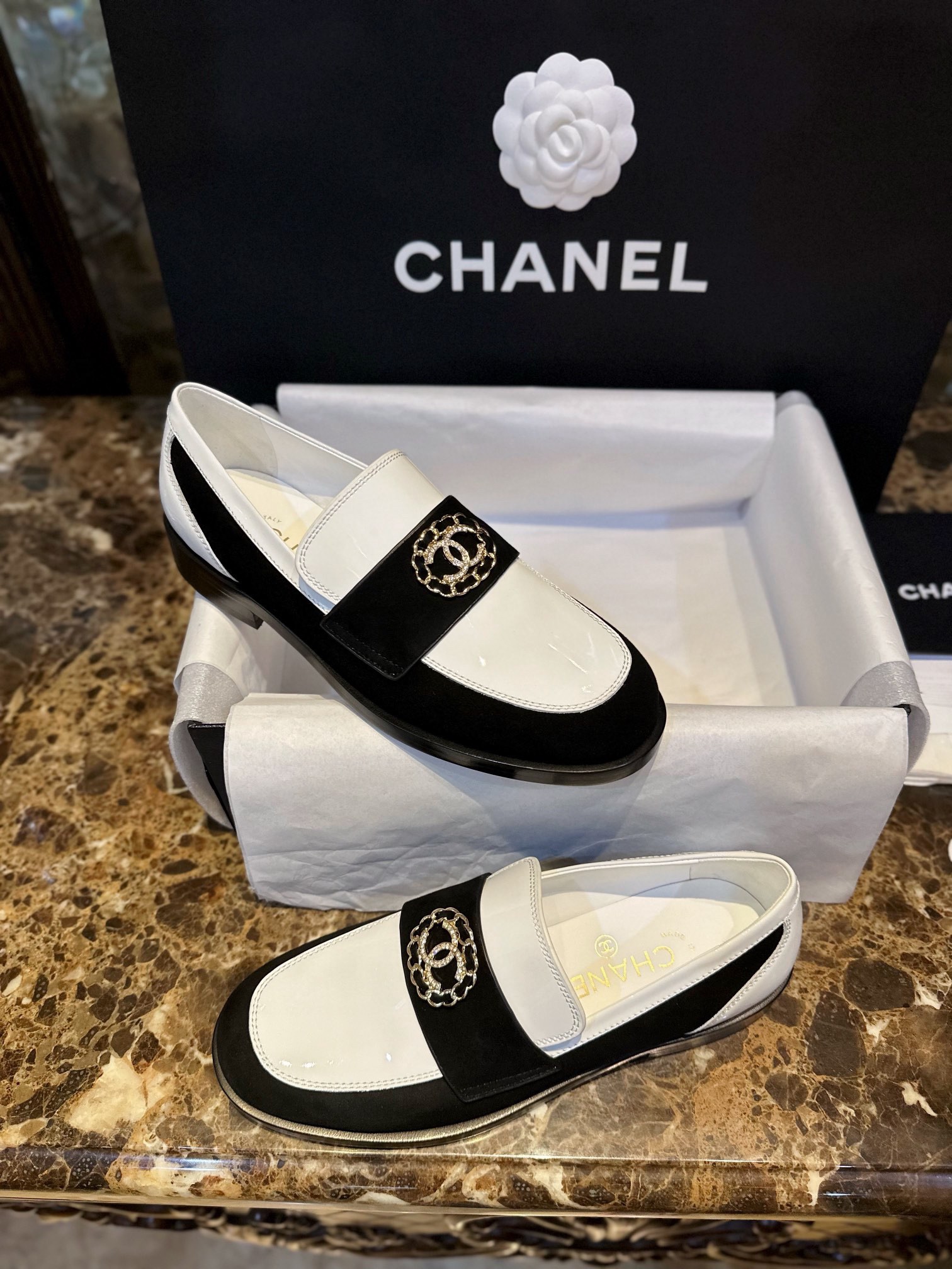 Chanel Black and White Round Buckle Loafers