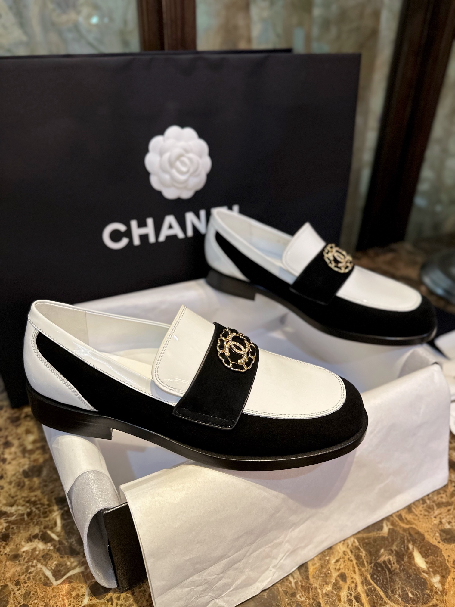 Chanel Black and White Round Buckle Loafers