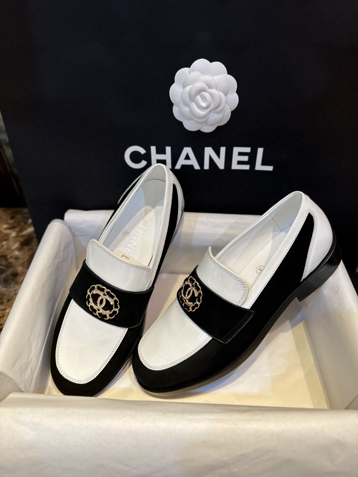 Chanel Black and White Round Buckle Loafers