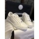 Chanel Embossed White Sneakers