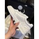 Chanel Embossed White Sneakers