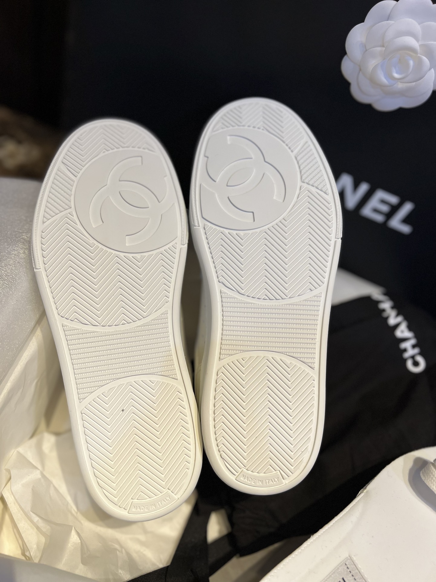 Chanel Embossed White Sneakers