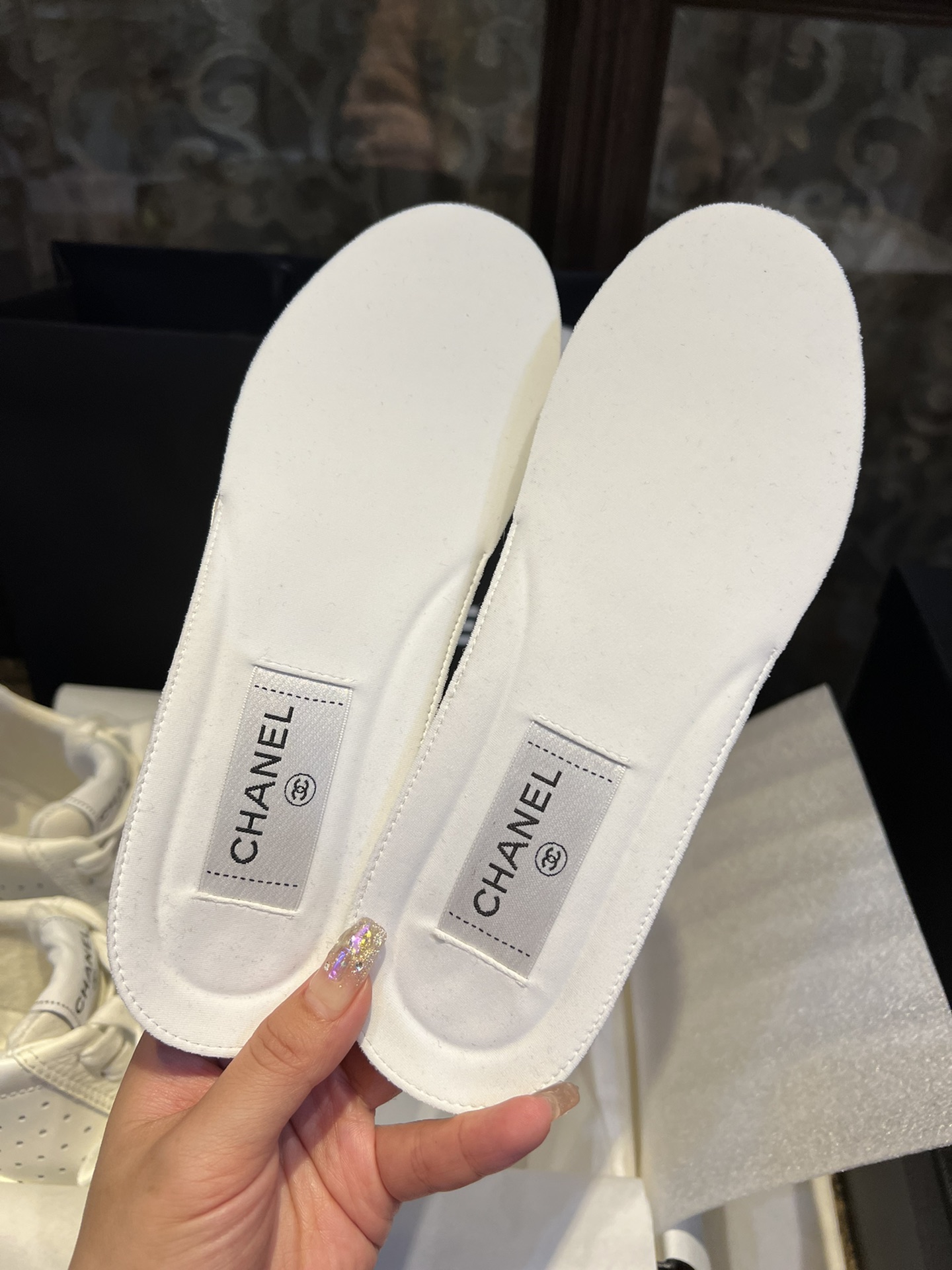 Chanel Embossed White Sneakers