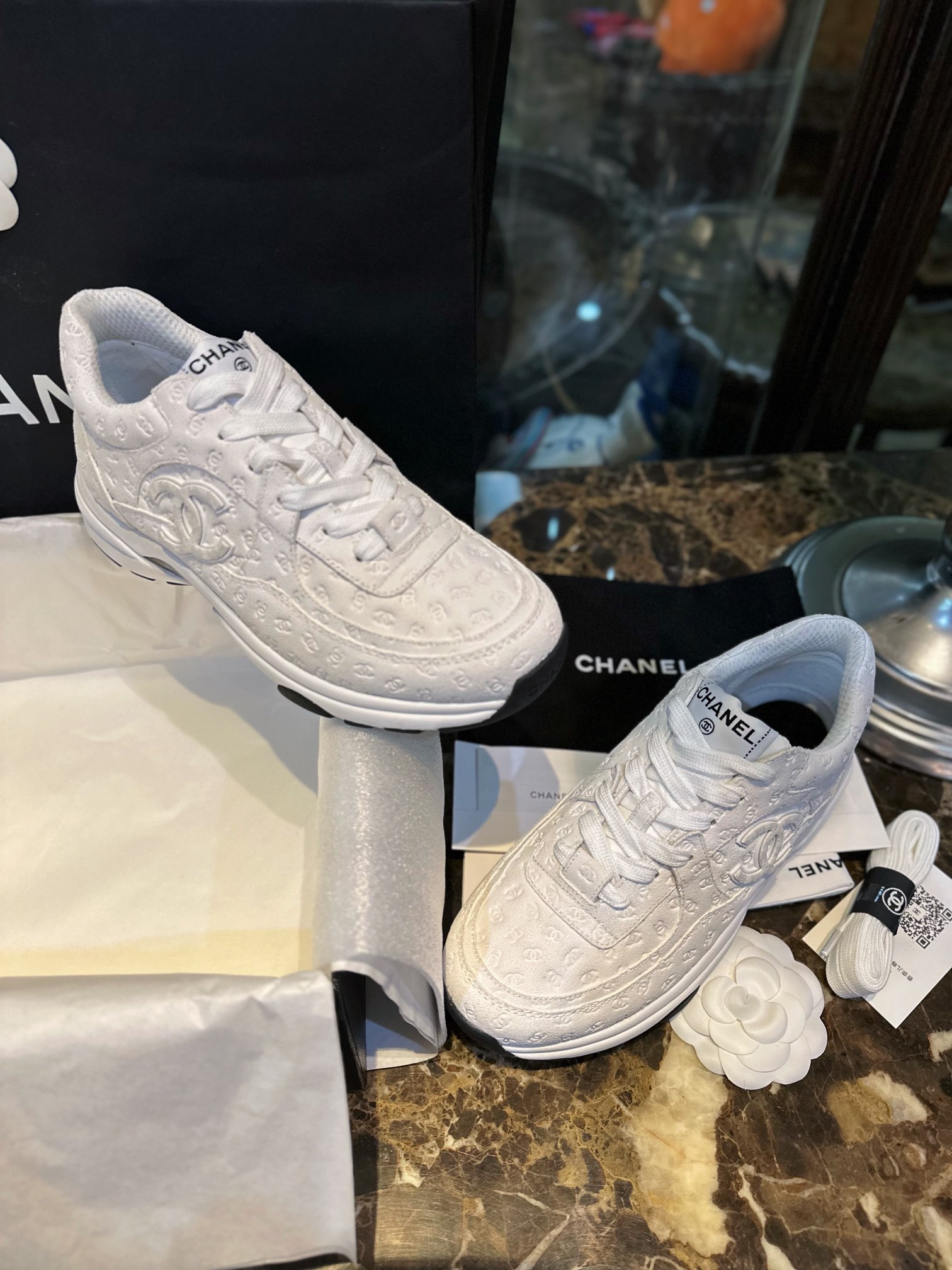 Chanel Solid Color Embossed Pattern Sneakers