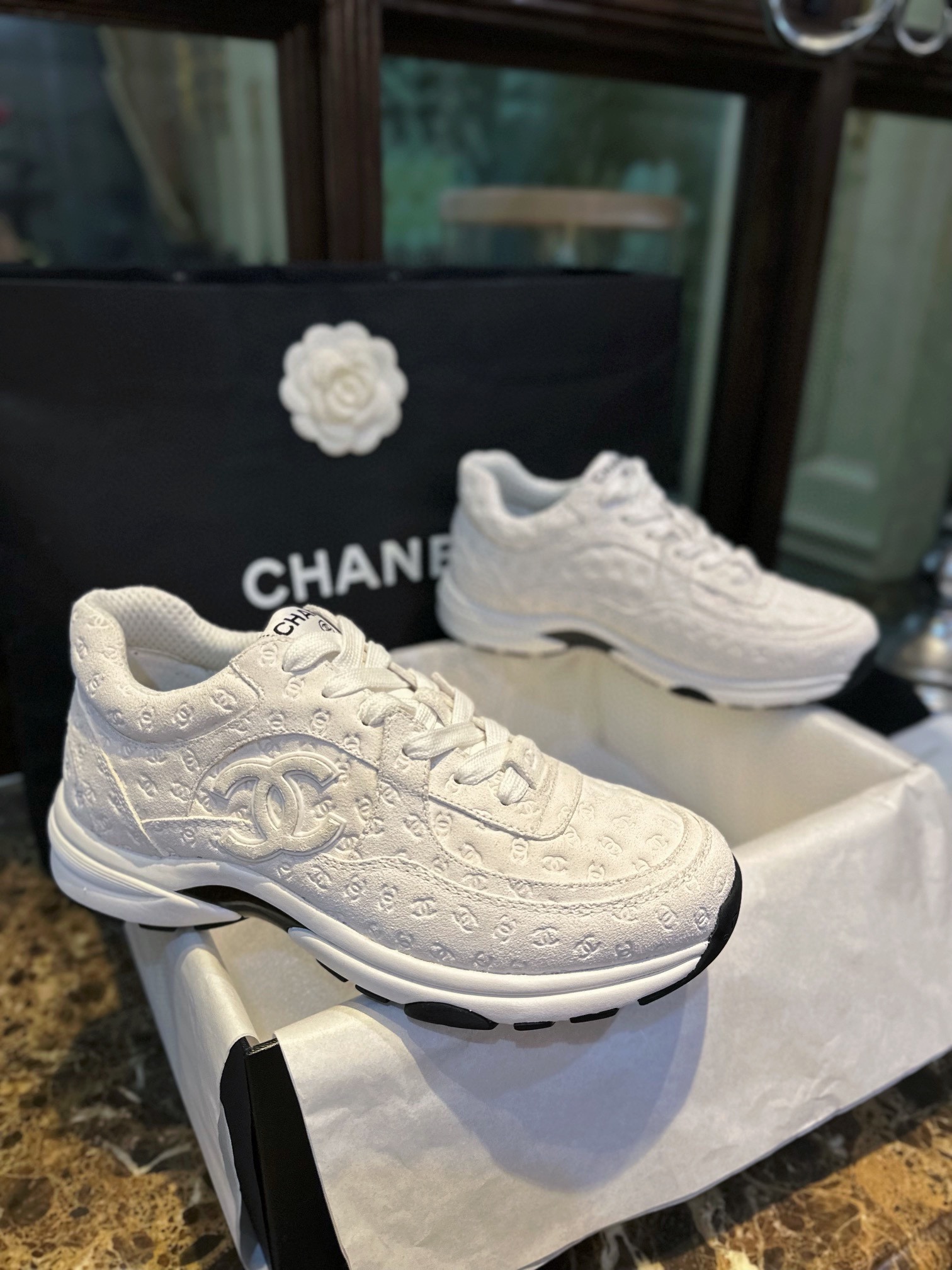 Chanel Solid Color Embossed Pattern Sneakers