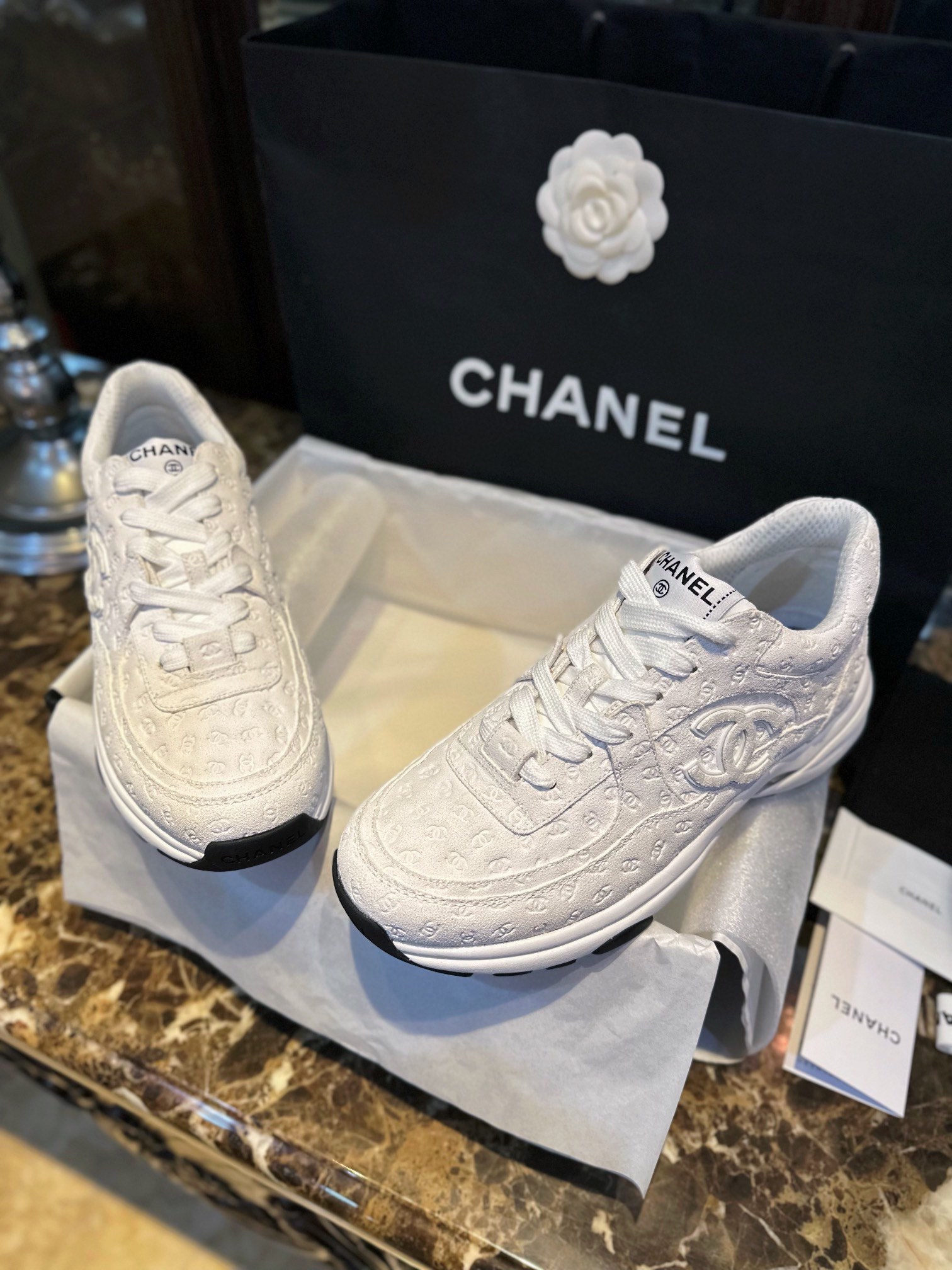 Chanel Solid Color Embossed Pattern Sneakers