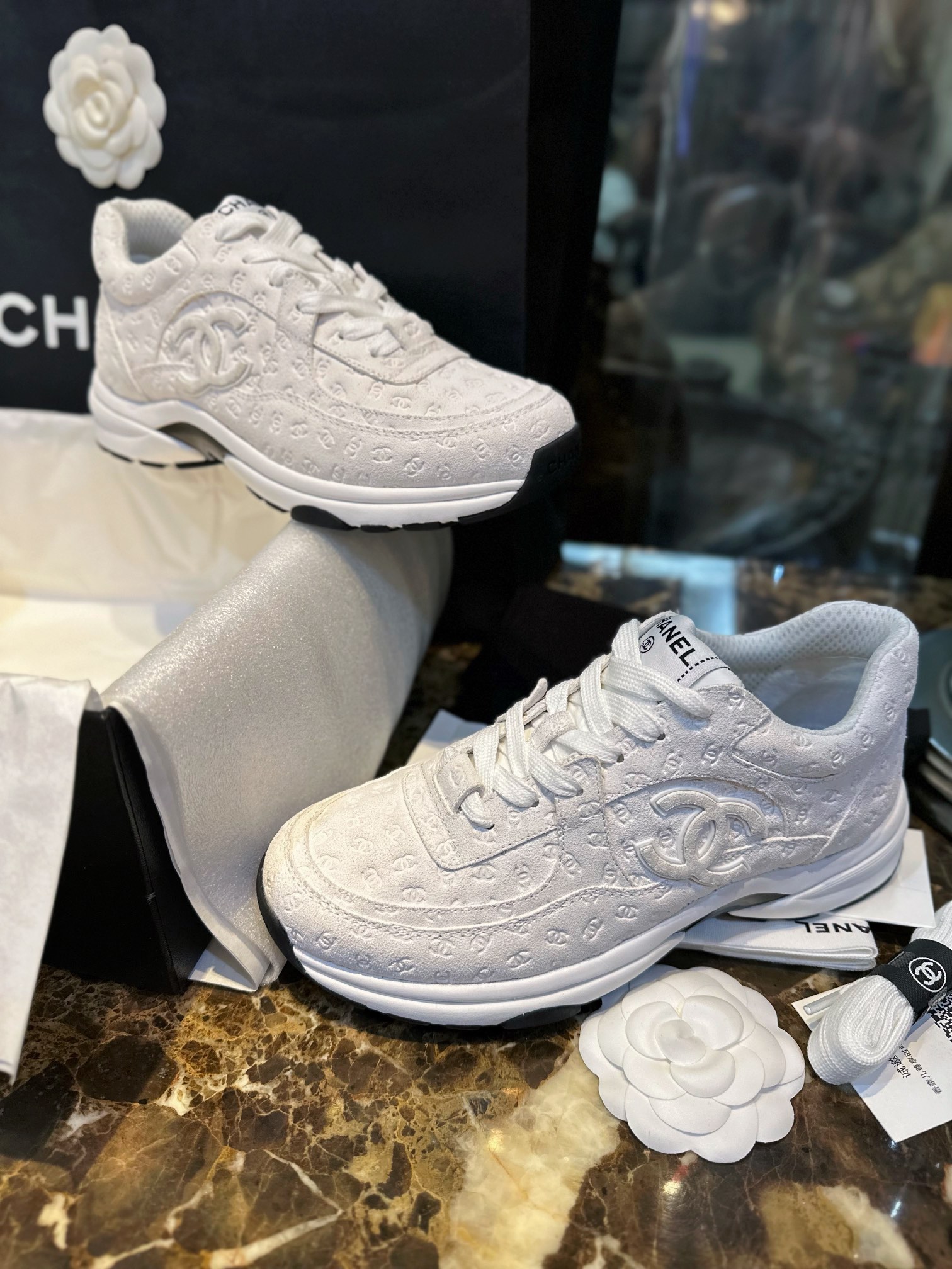 Chanel Solid Color Embossed Pattern Sneakers