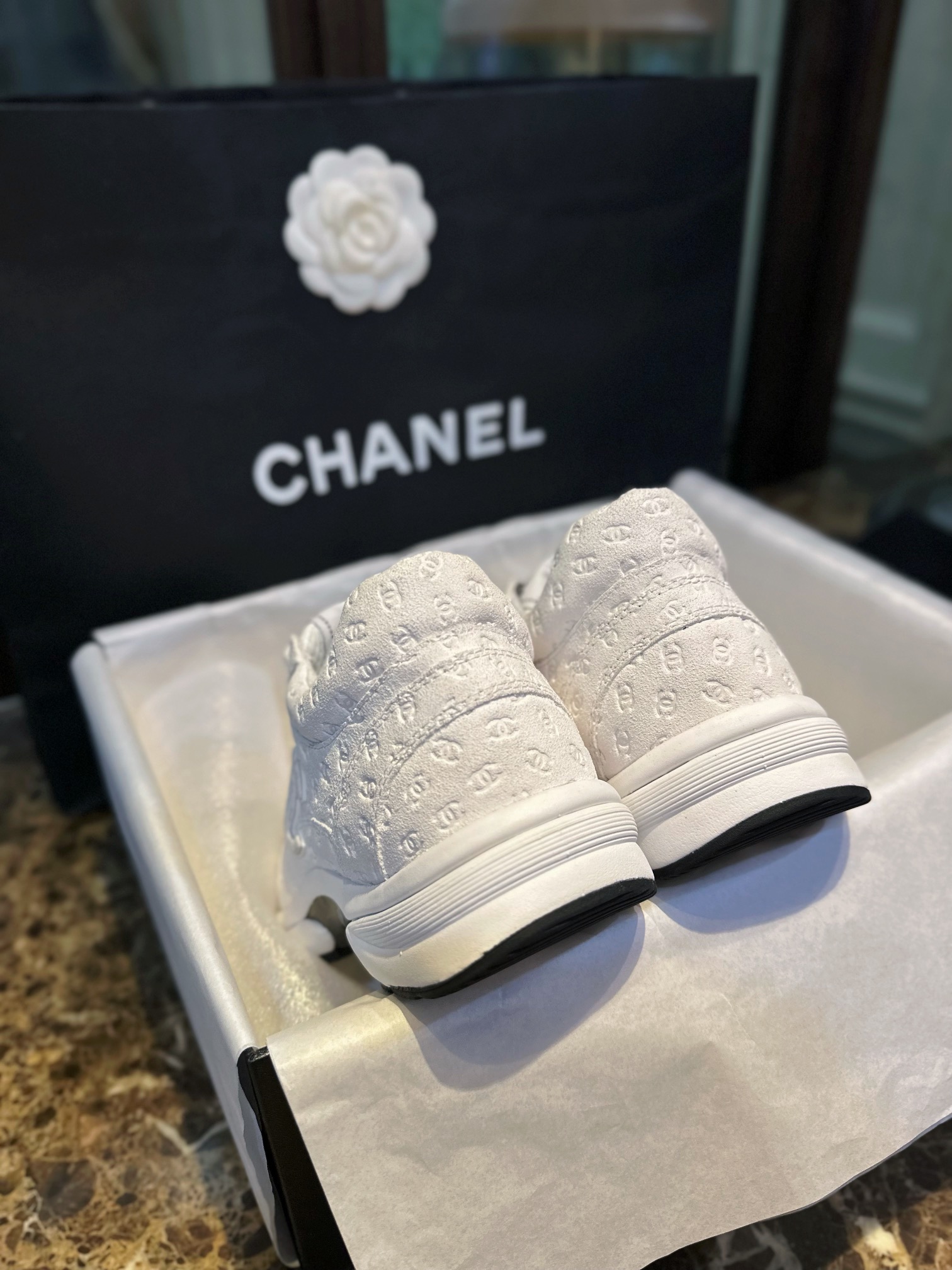 Chanel Solid Color Embossed Pattern Sneakers