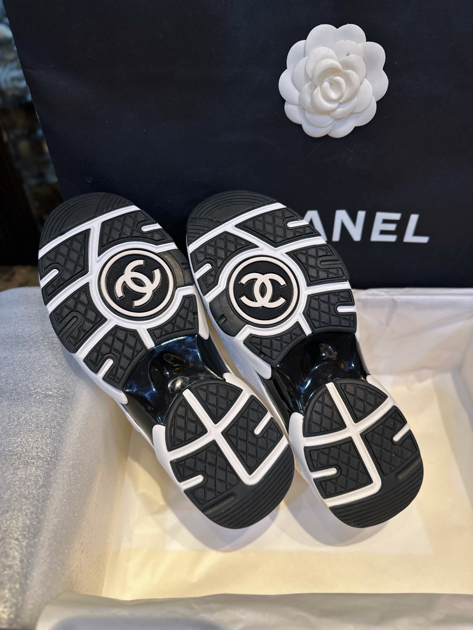 Chanel Solid Color Embossed Pattern Sneakers