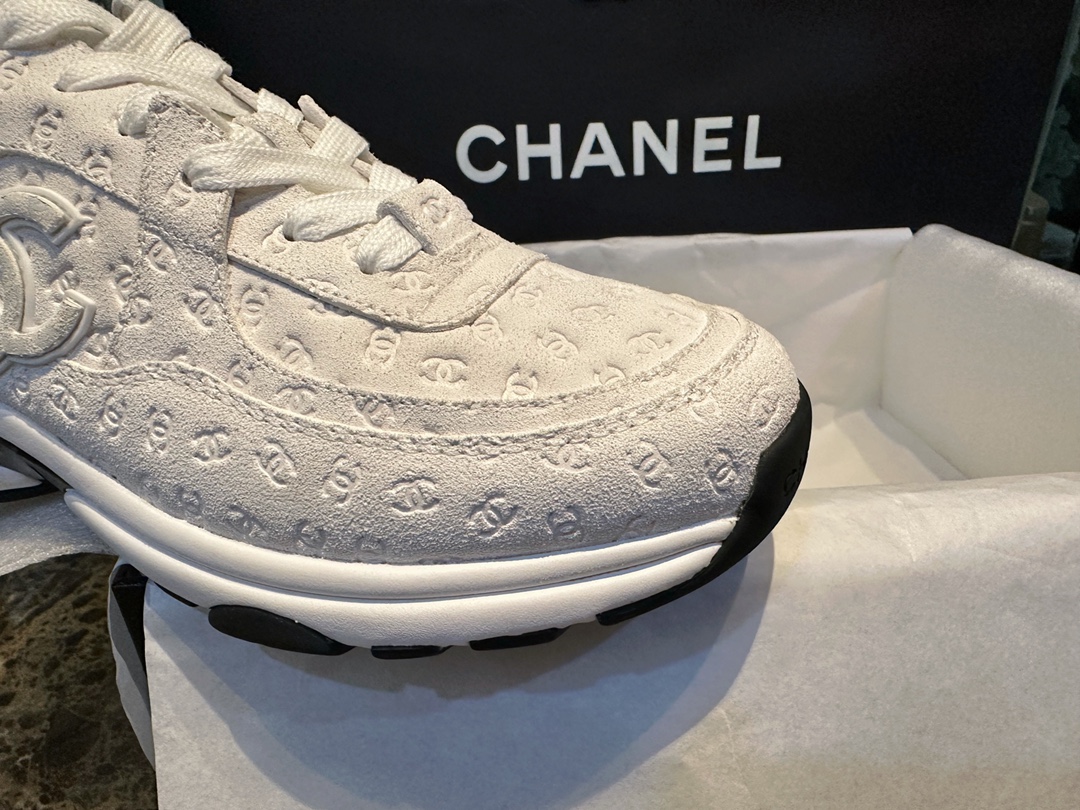 Chanel Solid Color Embossed Pattern Sneakers