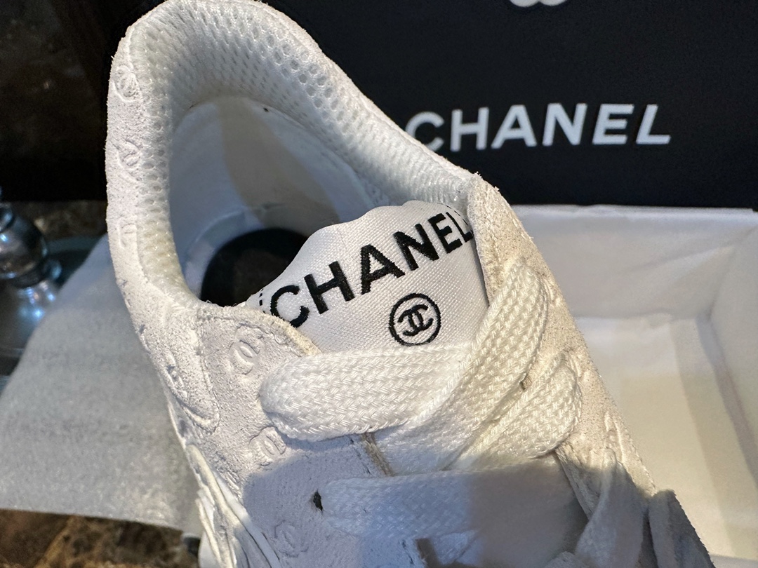 Chanel Solid Color Embossed Pattern Sneakers