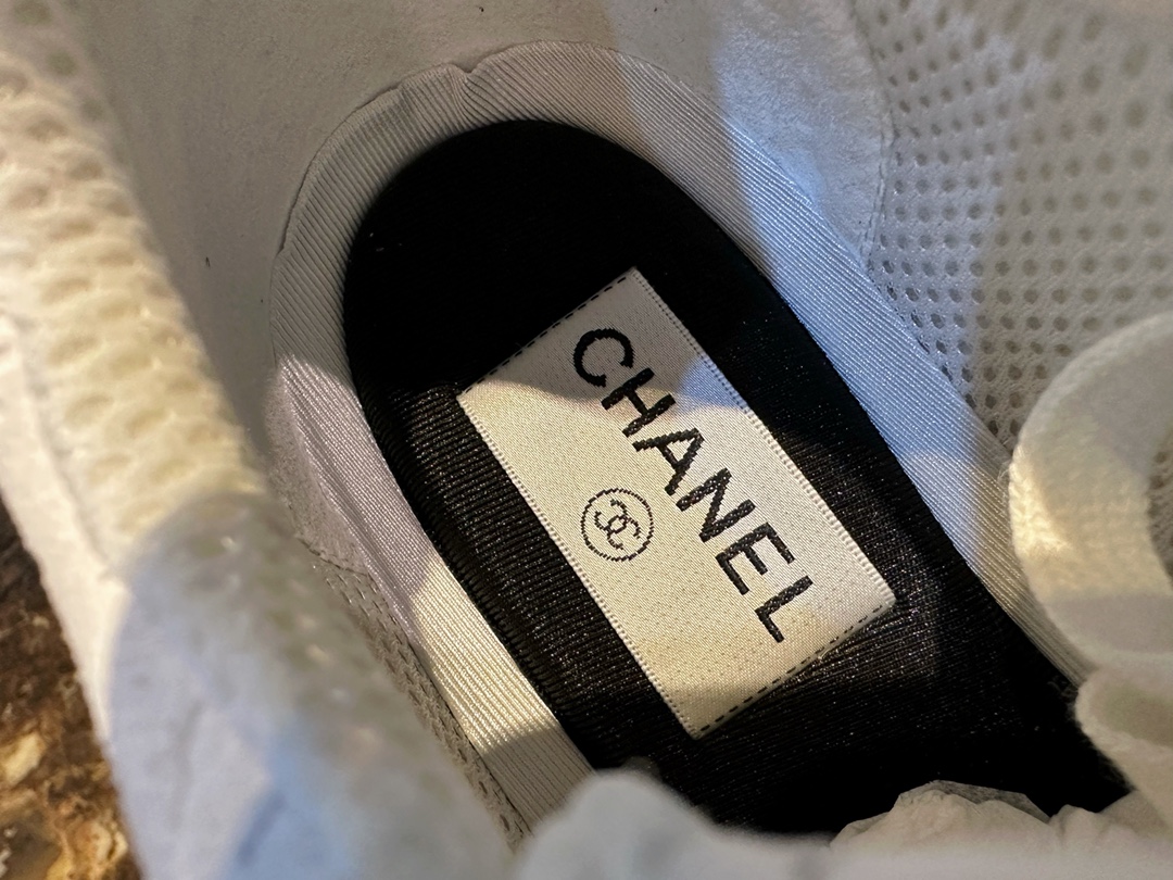 Chanel Solid Color Embossed Pattern Sneakers