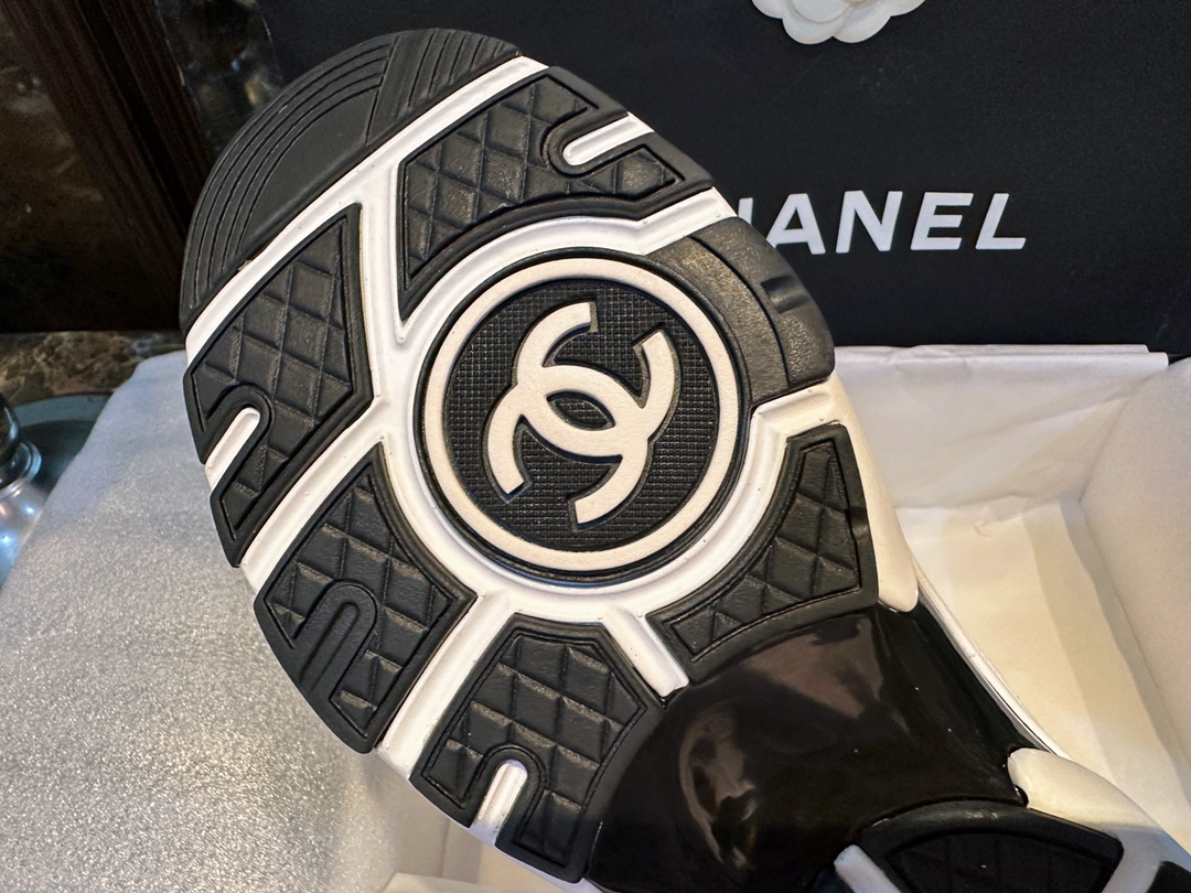 Chanel Solid Color Embossed Pattern Sneakers