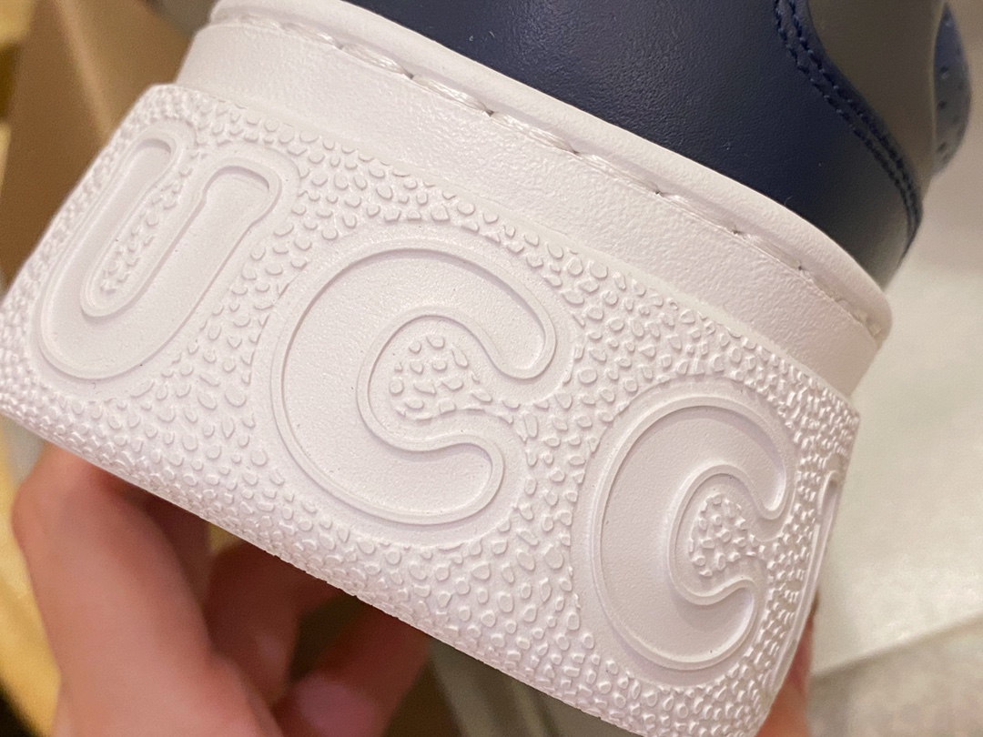  GG Embossed Biscuit Print Sneakers