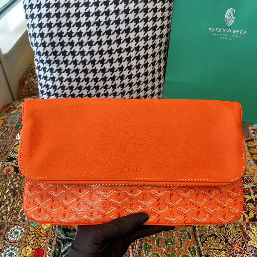 Goyard Sainte Marie Clutch, featuring a double-sided flap design with Goyardine canvas flap, two exterior patch pockets, and one large-sized zippered compartment. Size: 30X2X22cm