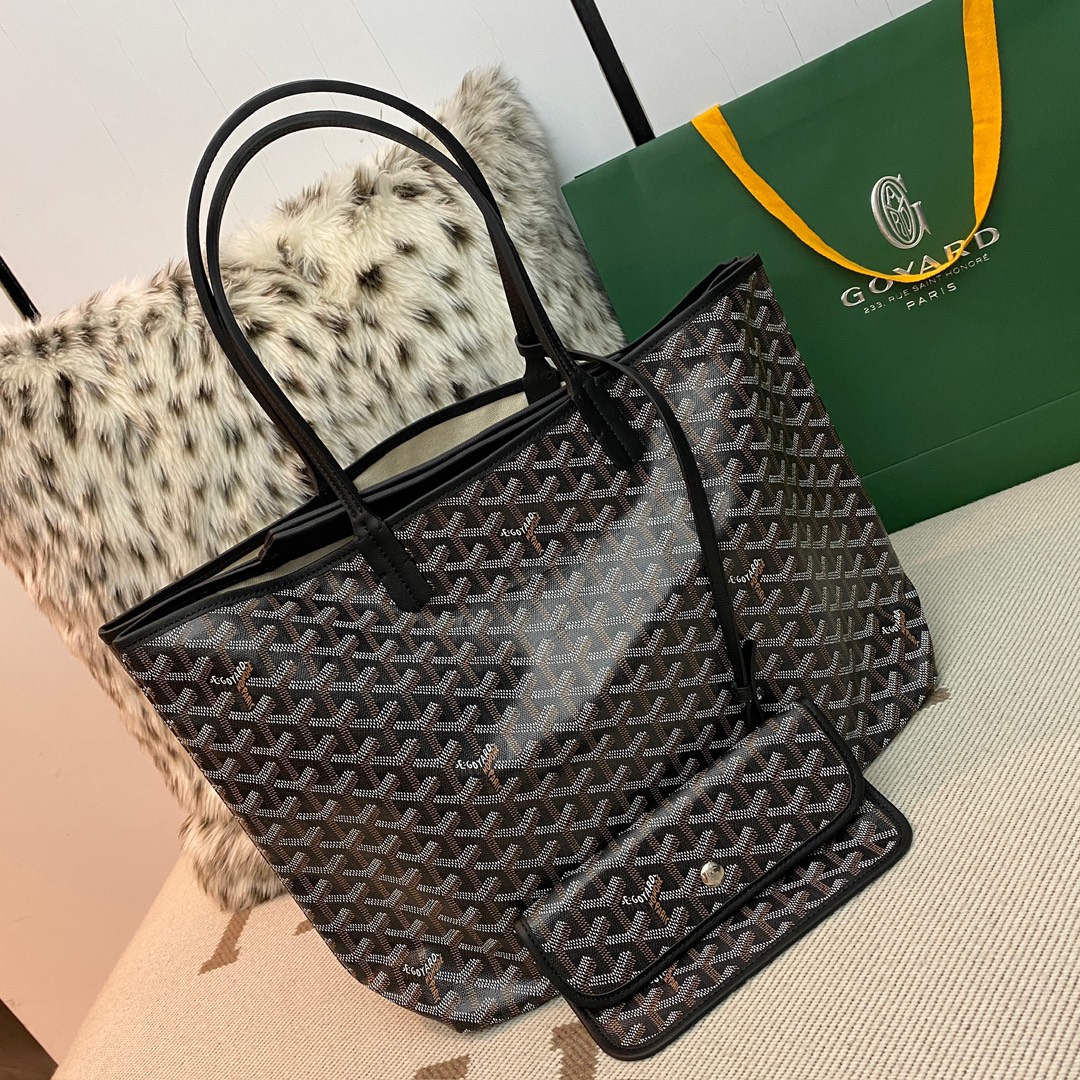 Goyard Isabelle Double-layer Tote Shopping Bag features two large shopping compartments with a magnetic snap closure calfskin divider in the middle, perfect for storing cards and cash for easy access. Size:25*14*35cm. 