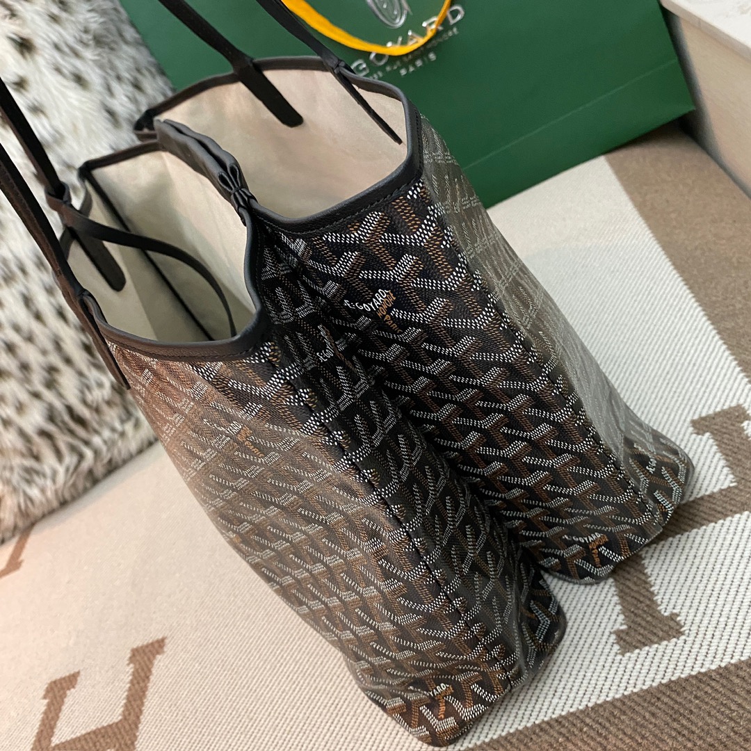 Goyard Isabelle Double-layer Tote Shopping Bag features two large shopping compartments with a magnetic snap closure calfskin divider in the middle, perfect for storing cards and cash for easy access. Size:25*14*35cm. 