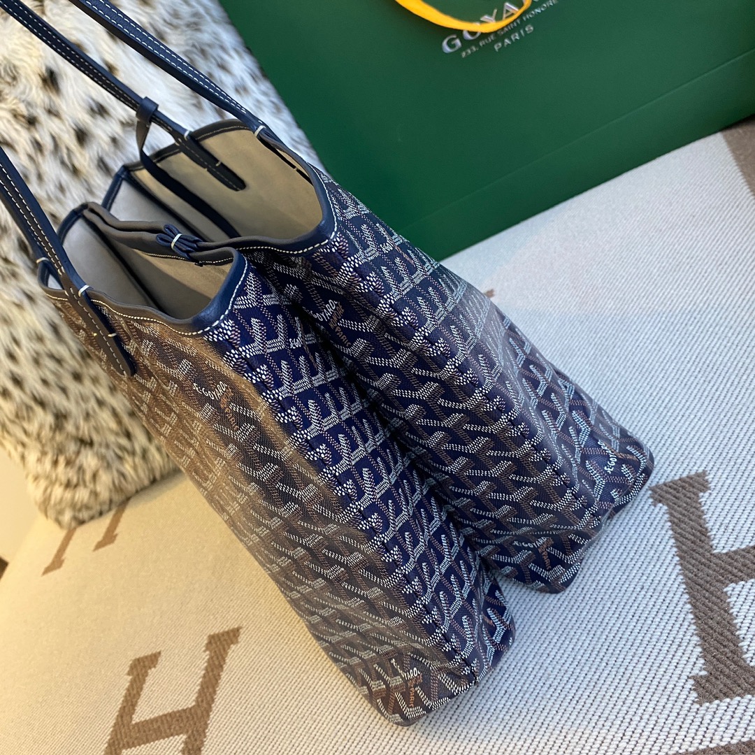 Goyard Isabelle Double-layer Tote Shopping Bag features two large shopping compartments with a magnetic snap closure calfskin divider in the middle, perfect for storing cards and cash for easy access. Size:25*14*35cm. 