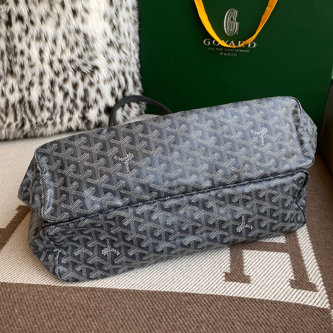 Goyard Isabelle Double-layer Tote Shopping Bag features two large shopping compartments with a magnetic snap closure calfskin divider in the middle, perfect for storing cards and cash for easy access. Size:25*14*35cm. 