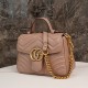 Gucci Marmont Messenger Bag in Milk Tea Brown Small, featuring leather top handle and chain shoulder strap, stitched V-shaped leather material