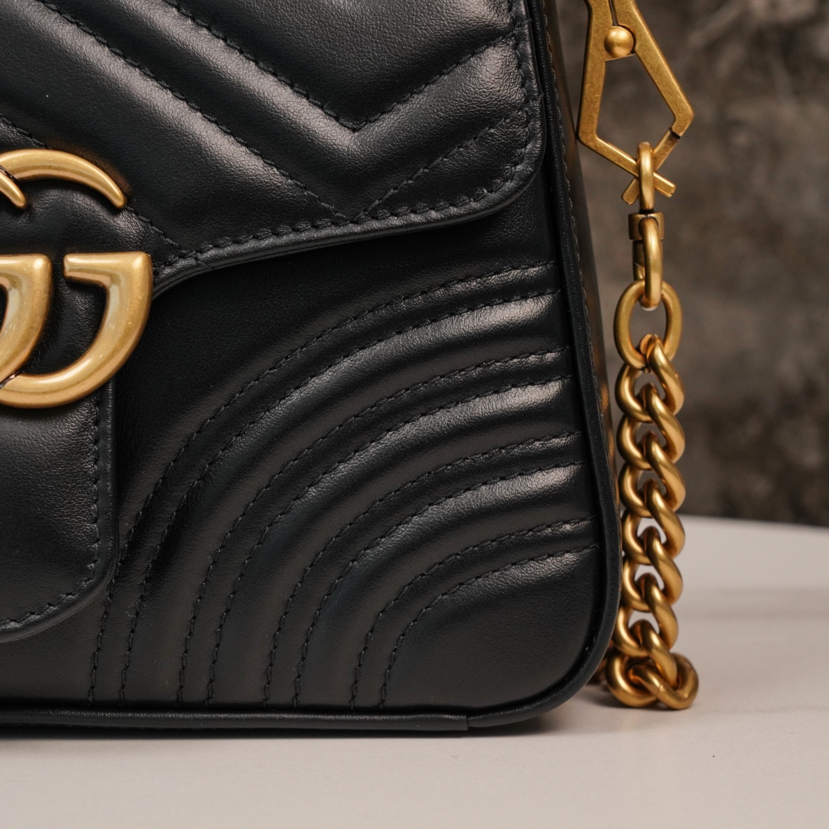 Gucci Marmont Messenger Bag in Black, Small Size, with Leather Top Handle and Chain Shoulder Strap, Stitched V-Shaped Leather Material