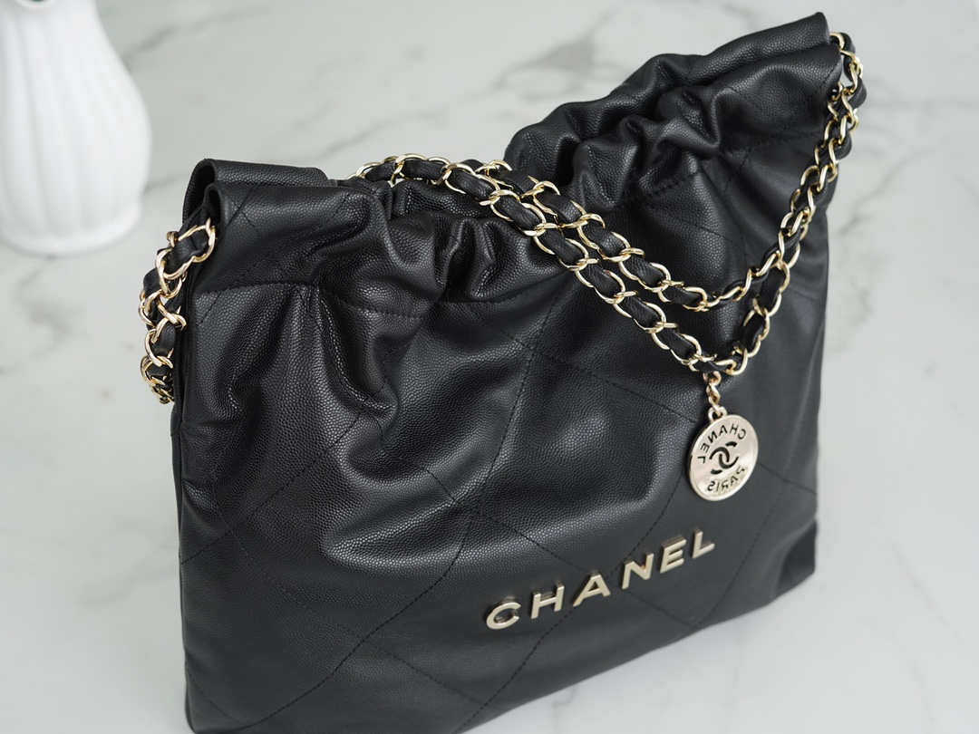 CHANEL 22P Handbag Black and Gold Caviar Leather  